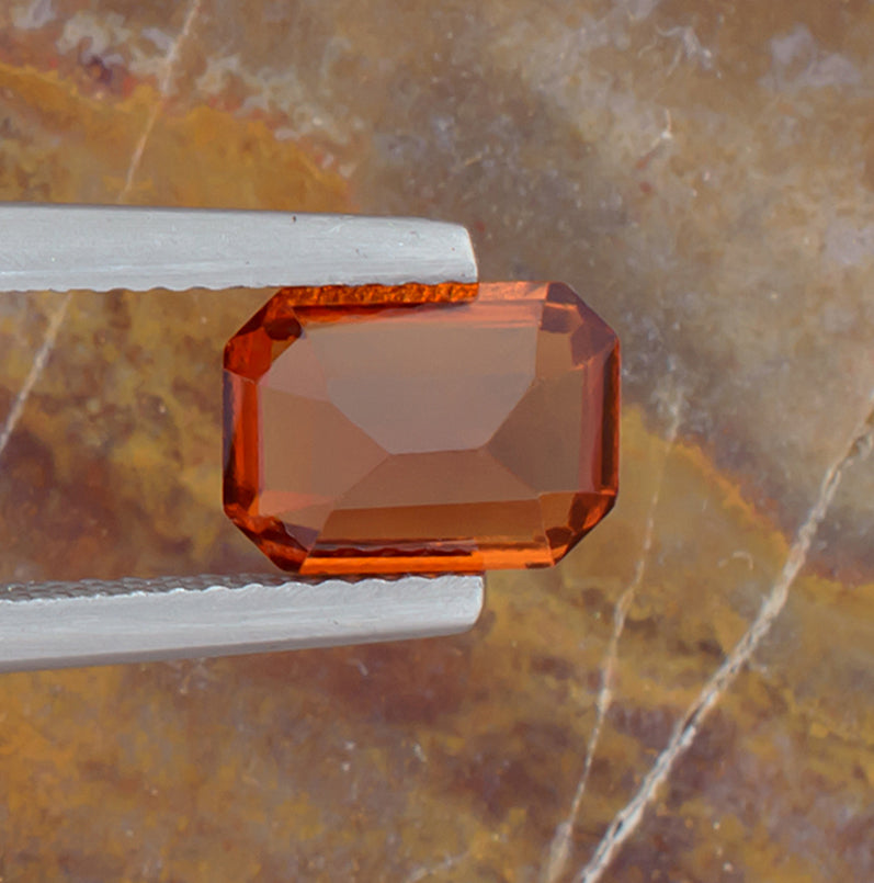 2.18ct Hessonite Garnet Colored Gemstone Bottom View Natural Background