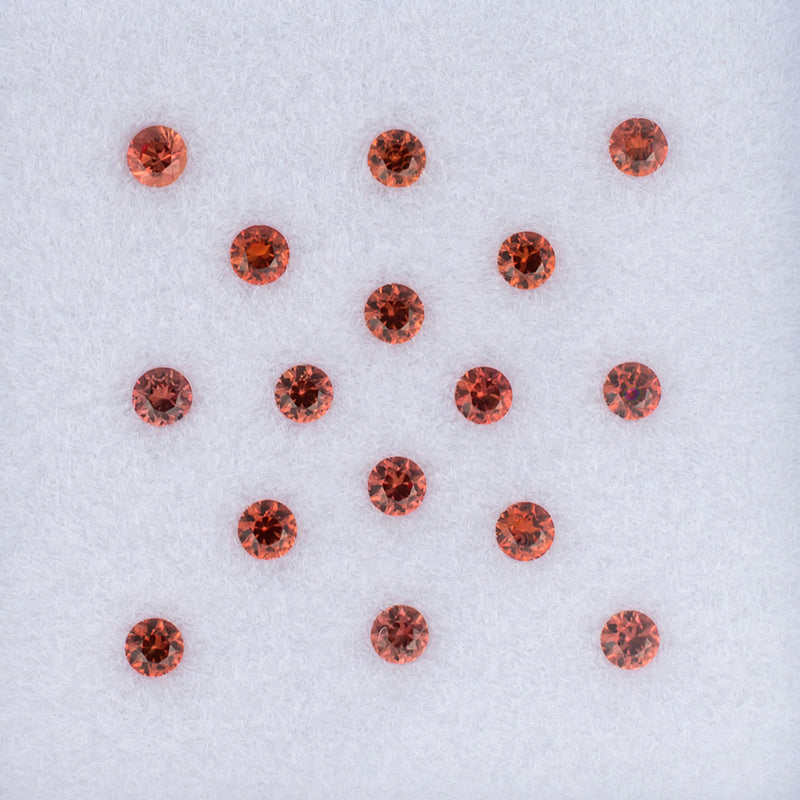 2.20mm Orange Sapphire Colored Gemstone Melee Parcel Top View White Background
