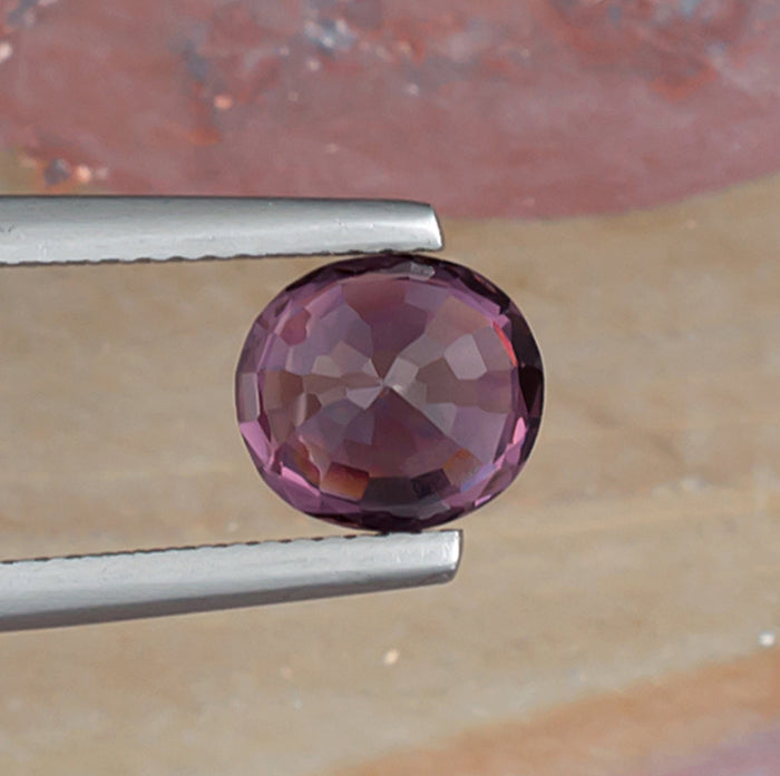 2.26ct Pink Spinel Colored Gemstone Bottom View Natural Background 
