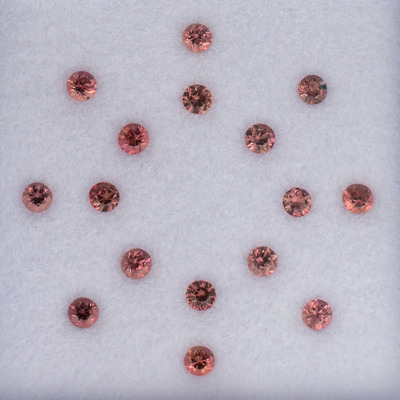 2.30mm Orange Sapphire Colored Gemstone Melee Parcel Top View White Background 
