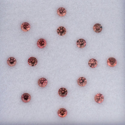 2.30mm Orange Sapphire Colored Gemstone Melee Parcel Top View White Background 
