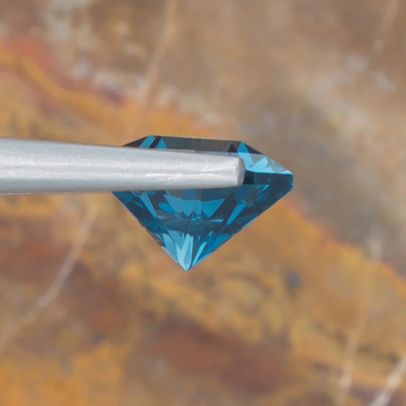 2.53ct Blue Topaz Colored Gemstone Side View Natural Background