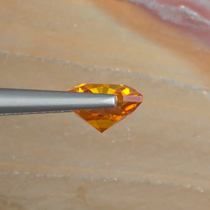2.58ct Sphalerite Colored Gemstone Side View Natural Background 
