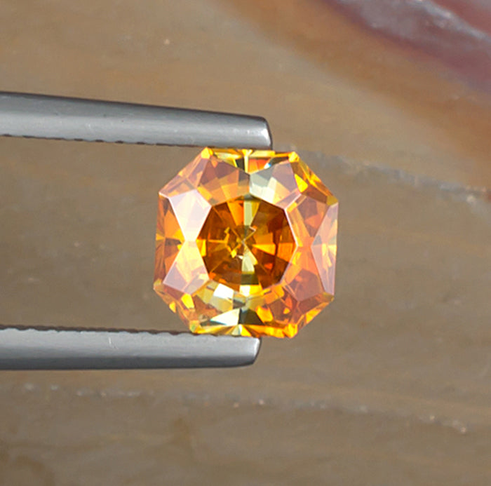 2.58ct Sphalerite Colored Gemstone Top View II Natural Background 
