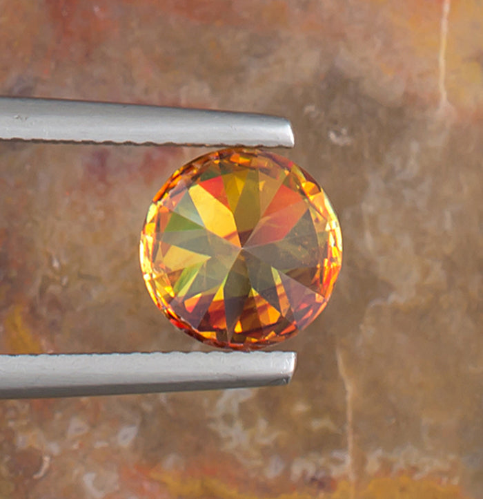 2.65ct Sphalerite Colored Gemstone Bottom View Natural Background 
