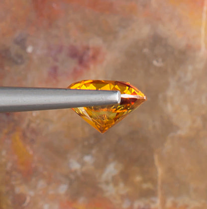 2.65ct Sphalerite Colored Gemstone Side View Natural Background 
