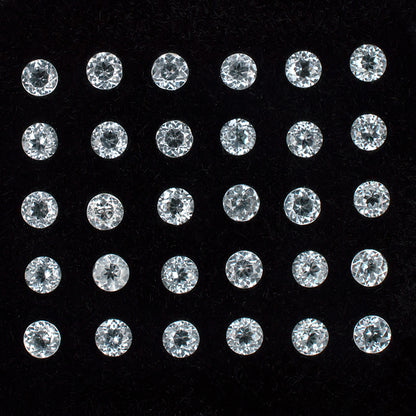 2.70mm White Topaz Gemstone Melee Parcel Top View Black Background
