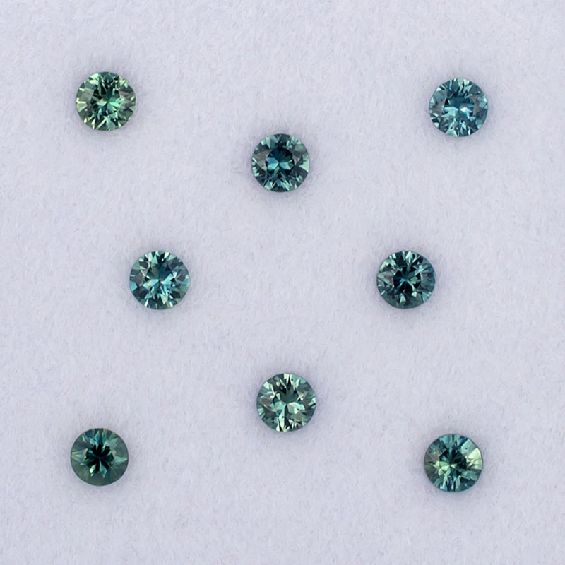 2.80mm Green Blue Sapphire Colored Gemstone Melee Parcel Top View White Background
