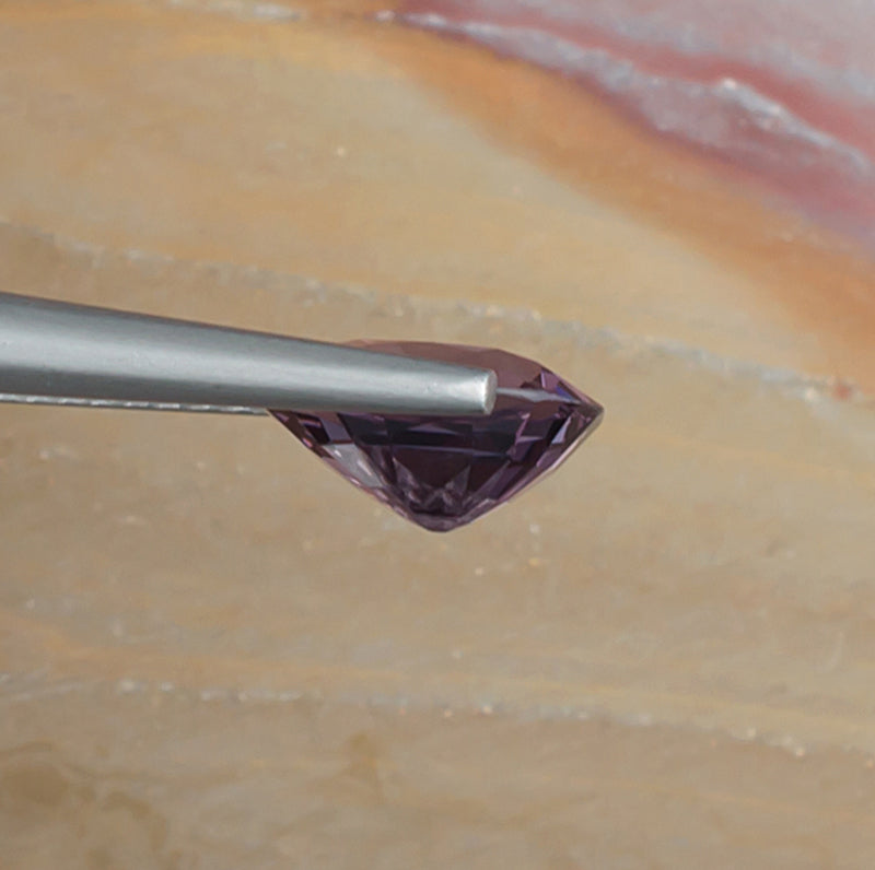 2.83ct Pink Spinel Colored Gemstone Side View Natural Background 
