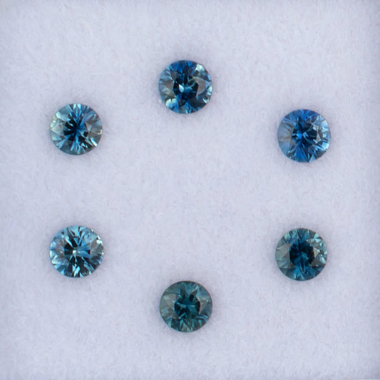 21466 Blue Sapphire Colored Gemstone Melee Parcel Top View White Background
