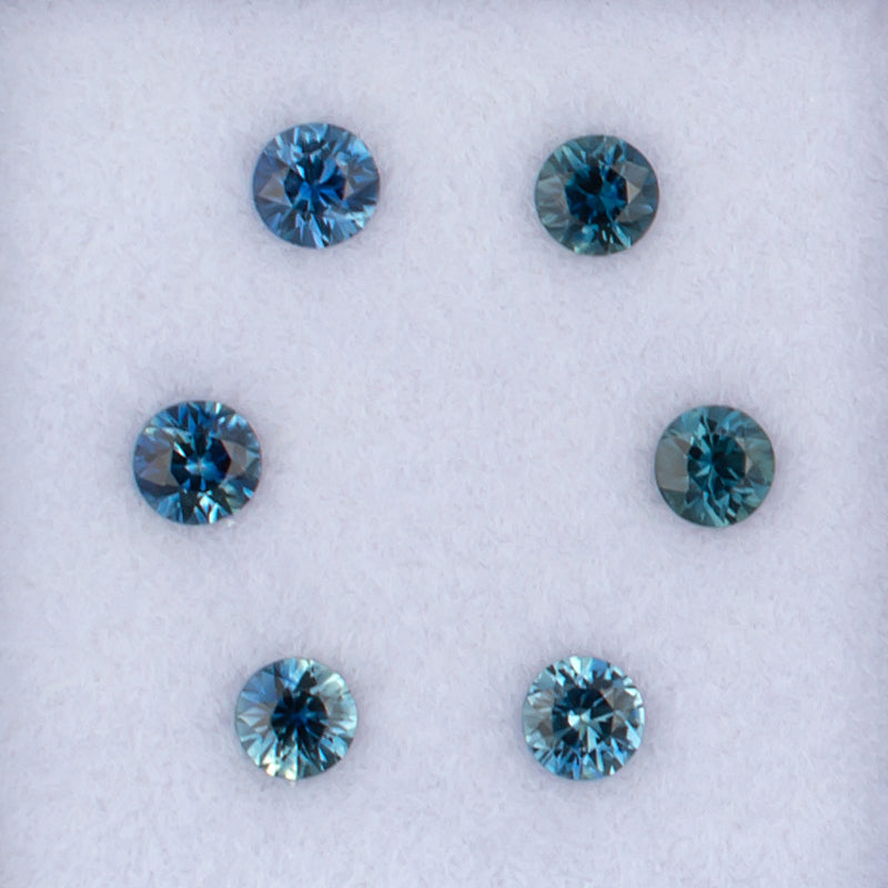 21466 Blue Sapphire Colored Gemstone Melee Parcel Top View White Background
