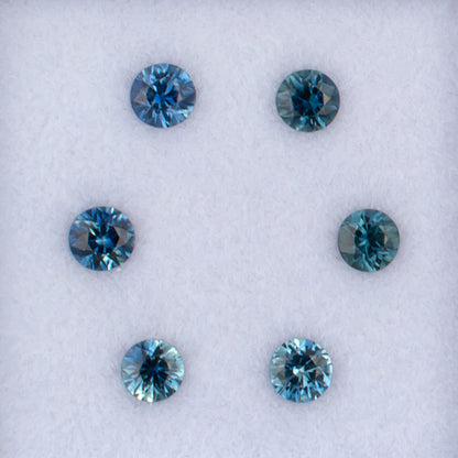 21466 Blue Sapphire Colored Gemstone Melee Parcel Top View White Background
