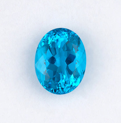 22.77ct Blue Topaz Colored Gemstone Top View White Background 
