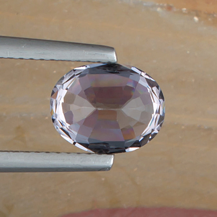 3.05ct Blue Spinel Colored Gemstone Bottom View Natural Background 
