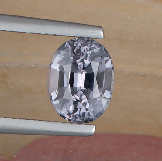 3.05ct Blue Spinel Colored Gemstone Top View Natural Background 
