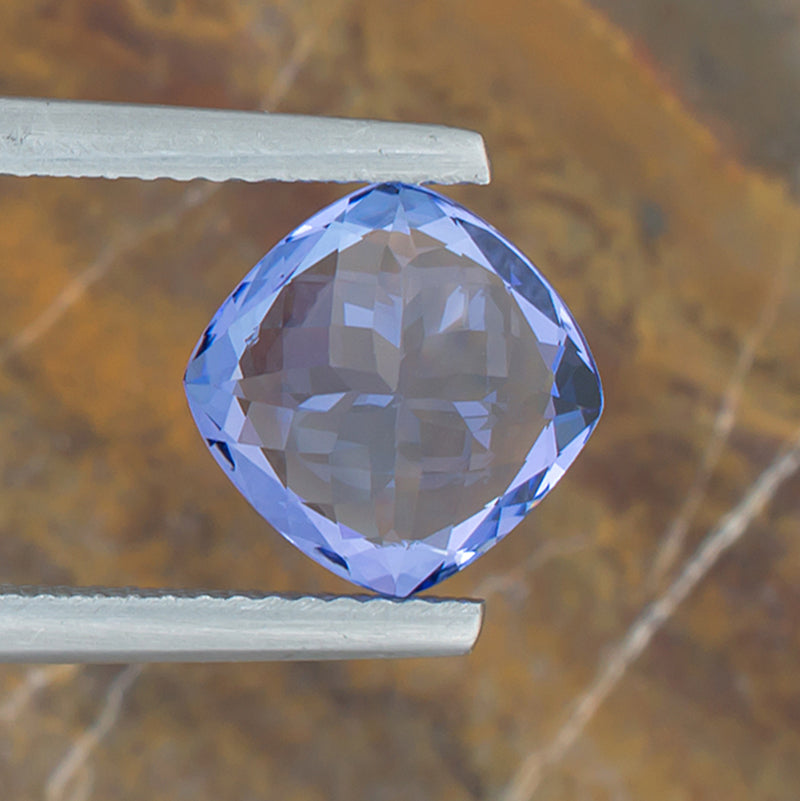 3.08ct Tanzanite Colored Gemstone Bottom View Natural Background