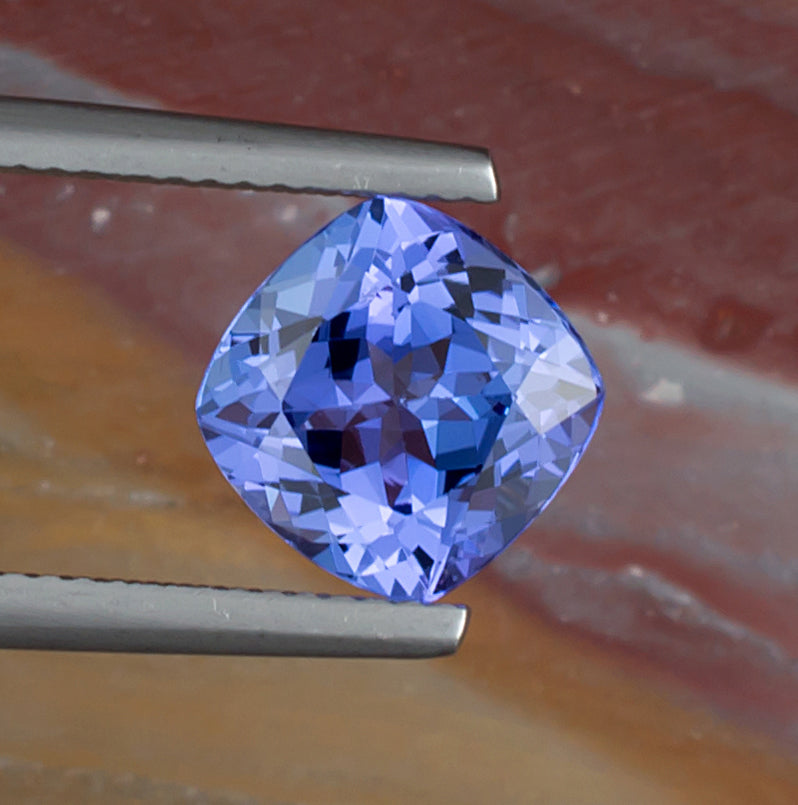 3.08ct Tanzanite Colored Gemstone Top View Natural Background 
