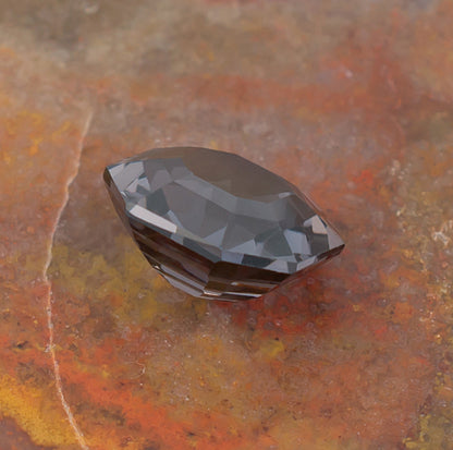 3.20ct Blue Spinel Colored Gemstone Side View Natural Background 
