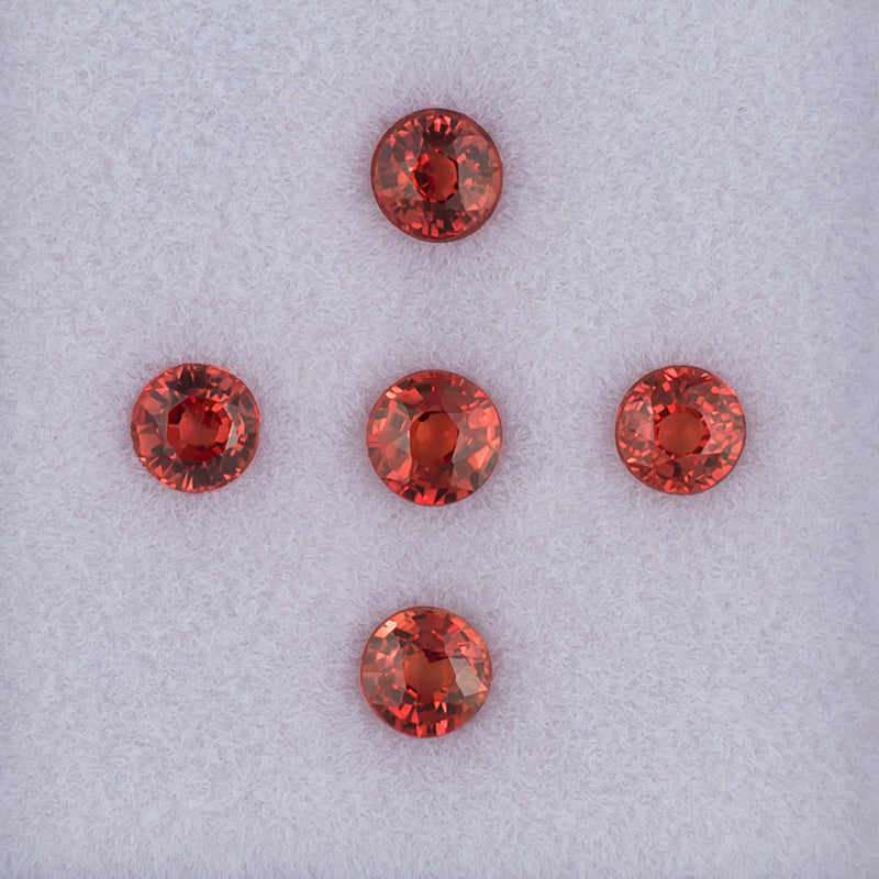 3.20mm Orange Sapphire Colored Gemstone Melee Parcel Top View White Background

