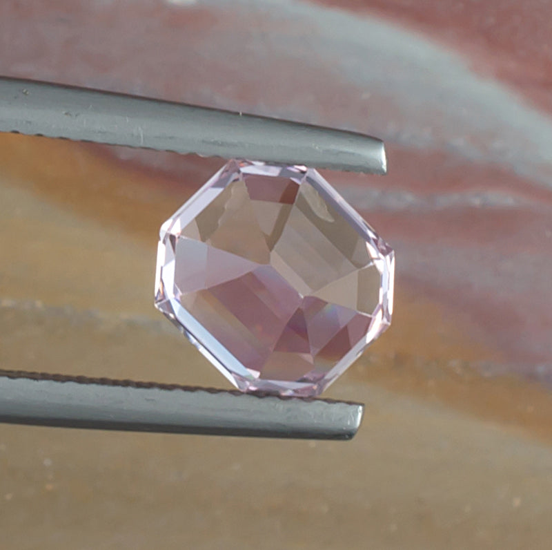 3.23ct Kunzite Colored Gemstone Bottom View Natural Background 
