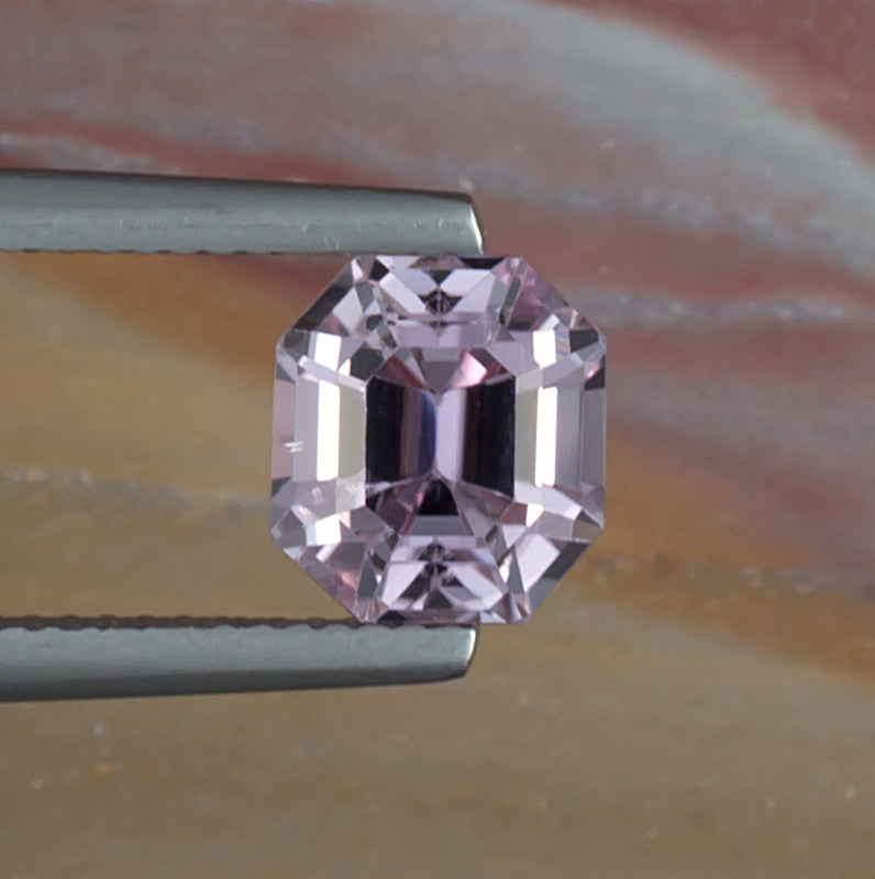 3.23ct Kunzite Colored Gemstone Top View Natural Background 
