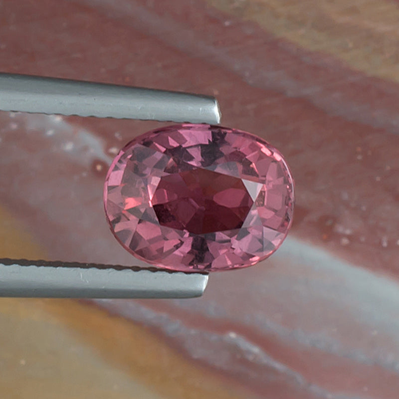 3.25ct Pink Sapphire Colored Gemstone Top View Natural Background E 21063