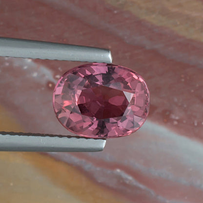 3.25ct Pink Sapphire Colored Gemstone Top View Natural Background E 21063