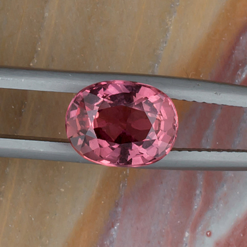3.25ct Pink Sapphire Colored Gemstone Top View Natural Background H 21063
