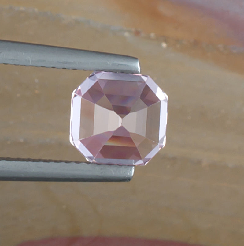 3.29ct Kunzite Colored Gemstone Bottom View Natural Background 
