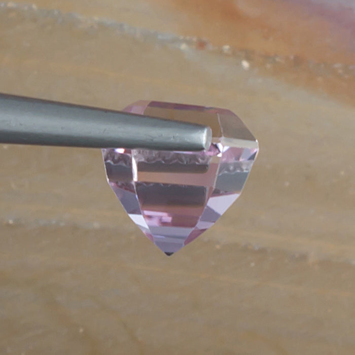 3.29ct Kunzite Colored Gemstone Side View Natural Background 
