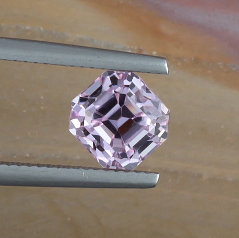 3.29ct Kunzite Colored Gemstone Top View Natural Background
