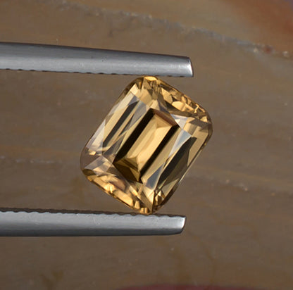 3.38ct Golden Zircon Colored Gemstone Top View Natural Background 

