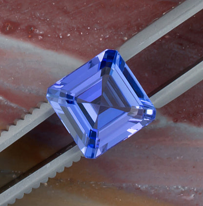 3.39ct Tanzanite Colored Gemstone Top View Natural Background
