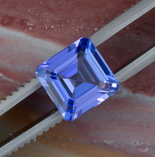 3.39ct Tanzanite Colored Gemstone Top View Natural Background
