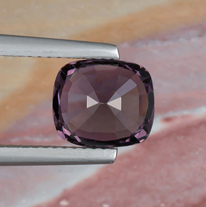 3.41ct Lavender Spinel Colored Gemstone Bottom View Natural Background 
