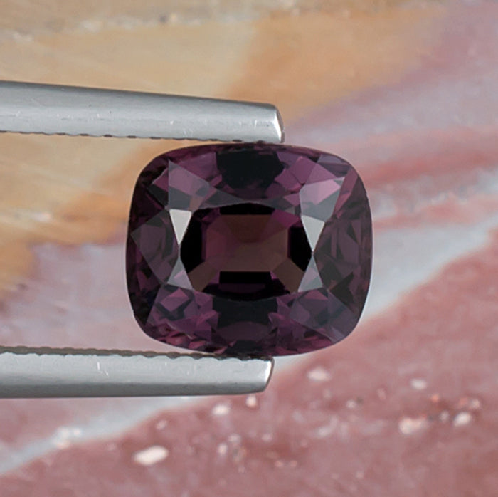 3.41ct Lavender Spinel Colored Gemstone Top View Natural Background 
