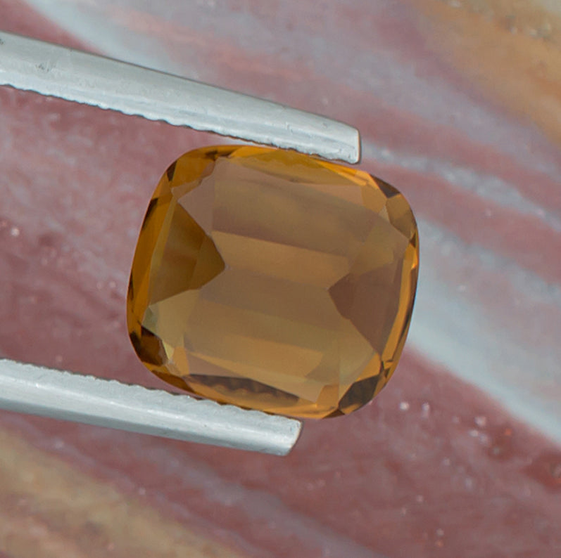 3.53ct Citrine Colored Gemstone Bottom View Natural Background 