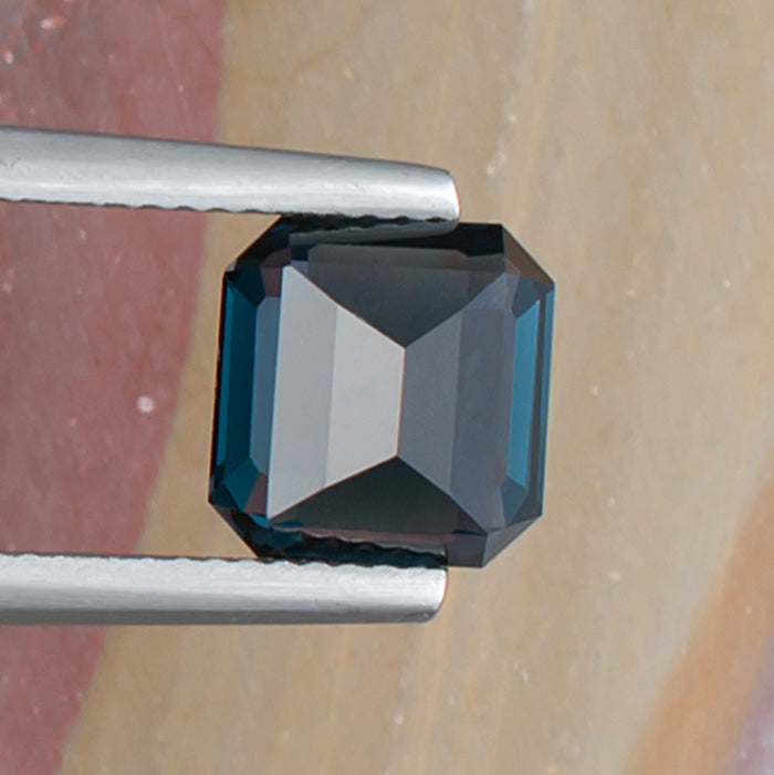 3.55ct Blue Spinel Colored Gemstone Bottom View Natural Background 

