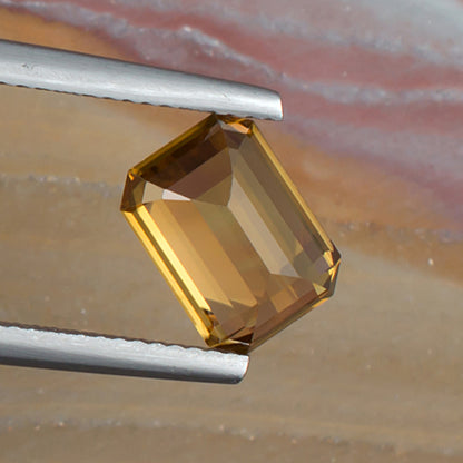 3.73ct Yellow Zircon Colored Gemstone Bottom View Natural Background 
