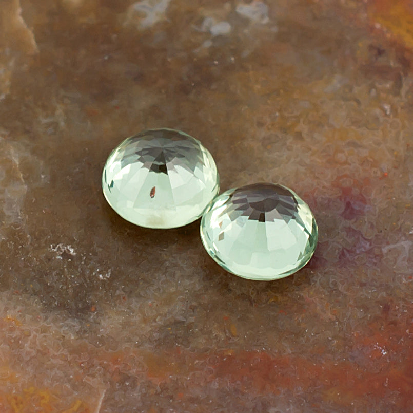4.20mm Green Sapphire Colored Gemstone Pair Bottom View Natural Background 
