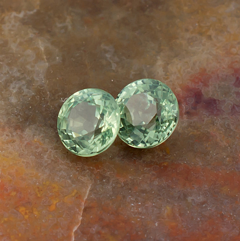 4.20mm Green Sapphire Colored Gemstone Pair Top View Natural Background
