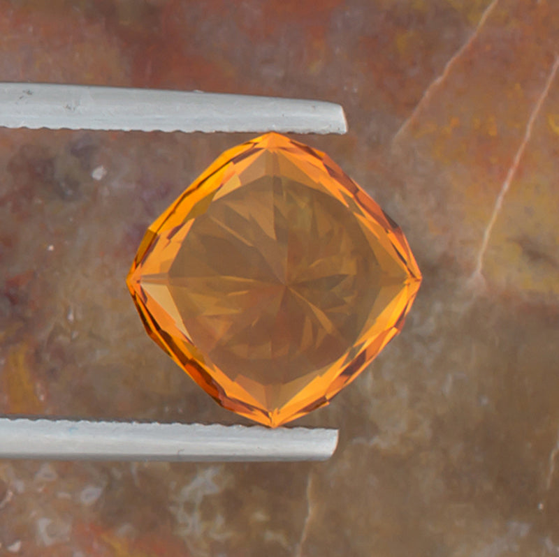 4.94ct Citrine Colored Gemstone Bottom View Natural Background
