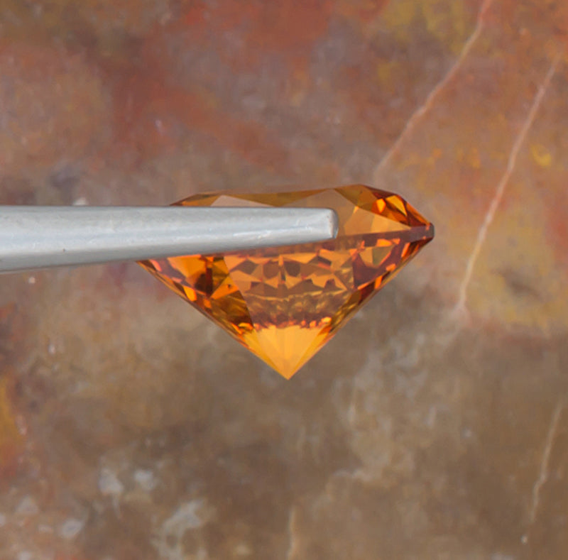 4.94ct Citrine Colored Gemstone Side View Natural Background 
