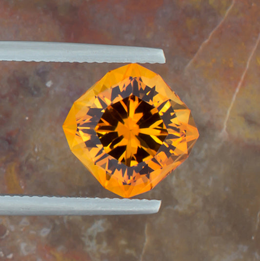 4.94ct Citrine Colored Gemstone Top View Angle Natural Background
