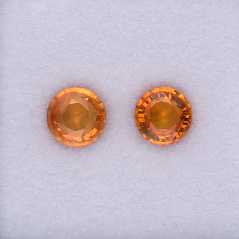 5.00mm Orange Sapphire Colored Gemstone Pair Top View White Background
