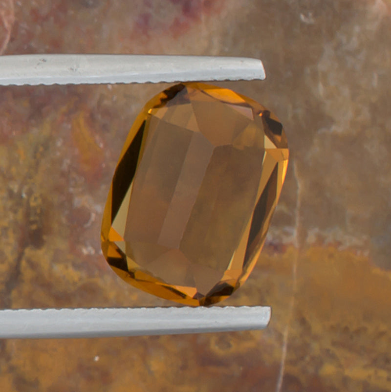 5.26ct Citrine Colored Gemstone Bottom View Natural Background 
