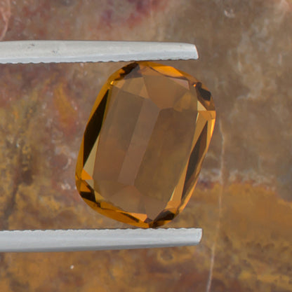 5.26ct Citrine Colored Gemstone Bottom View Natural Background 
