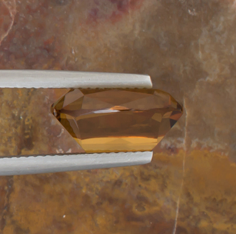5.26ct Citrine Colored Gemstone Side View Natural Background 
