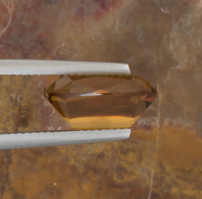 5.26ct Citrine Colored Gemstone Side View Natural Background 
