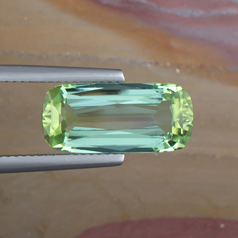 5.42ct Bicolor Tourmaline Colored Gemstone Top View Natural Background 
